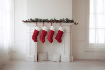 beautifully decorated american fireplace with large red stockings hanging cheerfully filled with festive gifts