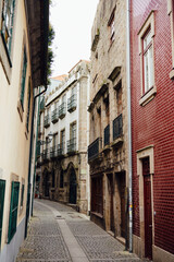 Narrow Cobbled Street with Historic Buildings in Ribeira Porto