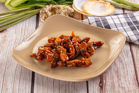 Razor shell mollusk with sauce