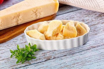 Parmesan cheese pieces in the bowl
