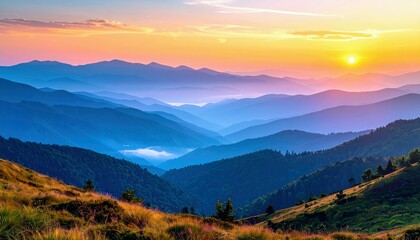 Fototapeta premium A breathtaking sunrise illuminates a vast mountain range, with layers of blue peaks receding into the distance under a colorful sky.
