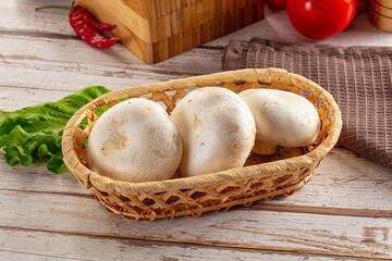 Raw white champignon mush heap