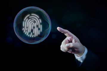 Businessman's hand points to a virtual fingerprint in abstract technology circle wave. Security and data. The process of scanning a fingerprint for authentication or data access