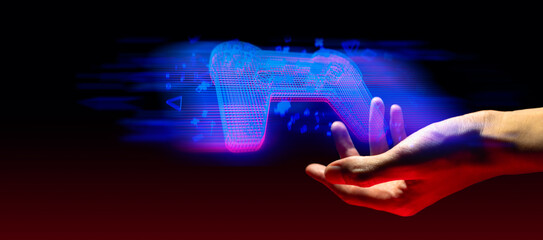 gamer hand touching and interactive to holographic of gaming joystick controller, game and esports technology