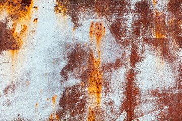 Fototapeta premium A rusty metal surface with a white background