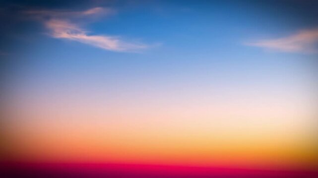 Vibrant sunset sky with soft clouds and a gradient of colors