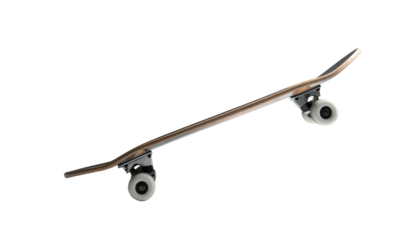 Angled view of a plain skateboard, isolated on black background