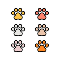 Set of six colorful animal paw print icons in various pastel and warm tones isolated on a black background