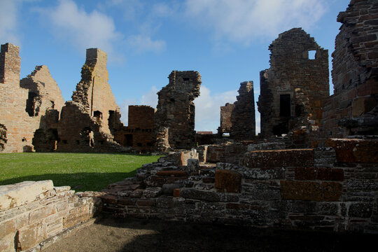 Ruins of the Earls Palace landmark in Kirkwall, Orkney, a moody historic 16th-century Renaissance fortress featuring crumbling archways, aged stonework, and atmospheric courtyards.