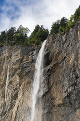 Obraz premium Staubbach falls dropping off the steep cliff face