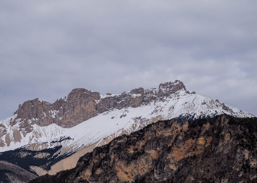 Panoramic view of rugged snow-covered Pic de Bure French Alps