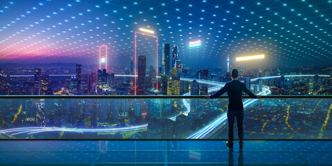 Businessman looking at futuristic city with data network overlay