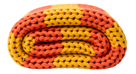 Cozy rolled up blanket with warm orange and yellow colors on black background