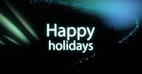 Glowing 'Happy holidays' neon text centering in night sky with aurora, green beams, snow, trees