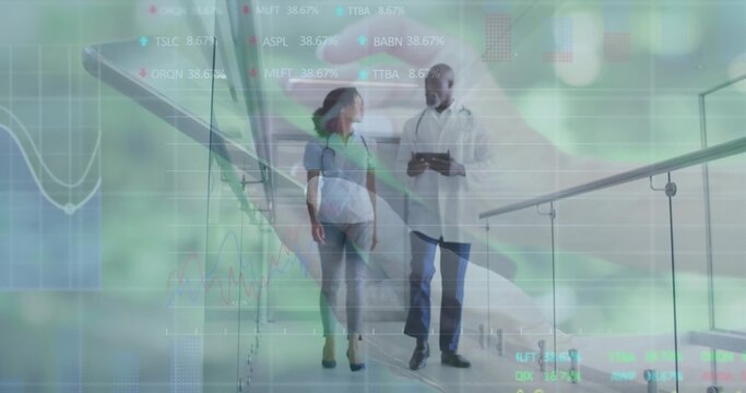 Walking clinician in lab coat and pregnant woman holding abdomen in clinic corridor, tablet HUD