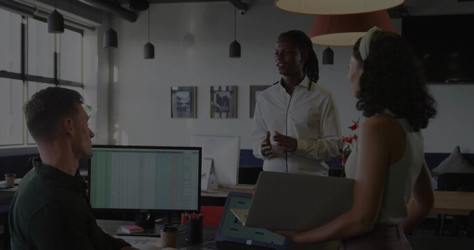 Speaking man in white shirt gesturing at team in open office, woman with headband, spreadsheet - Powered by Adobe