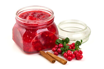 Lingonberry Jam Jar with Cinnamon Sticks, Vaccinium vitis idaea, isolated on white background