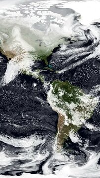 Equirectangular map of the precipitation on North America and South America. Seamless animation. Vertical video. Elements of this image furnished by NASA