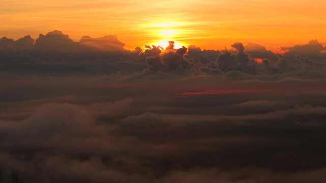 Clouds and mist at sunrise, the movement of colorful clouds in the morning, a new beginning.