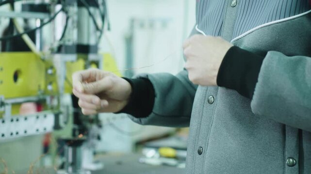 Electric Vehicle Assembly Line Manufacturing Worker