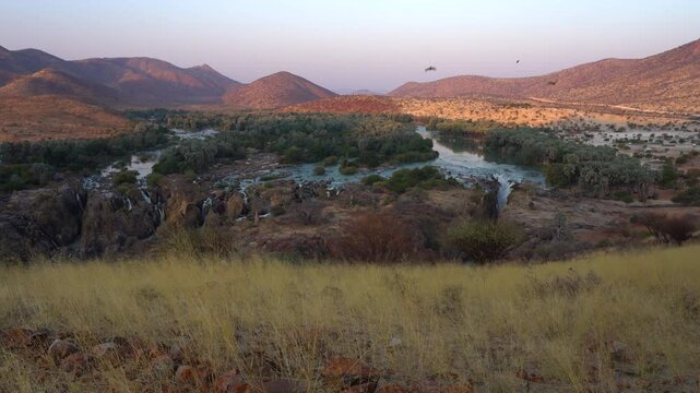 Dolly on Epupa falls at sunset in Kaokoland in Namibia, Africa.