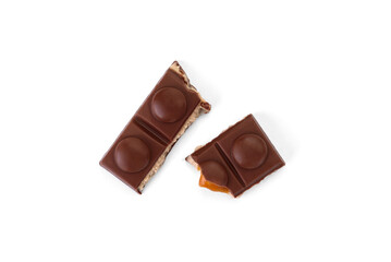 Chocolate bar with caramel, nougat and nuts filling isolated on white background.