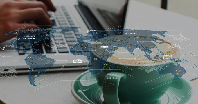 Hands starting typing over laptop keys while green cup foreground, world map visualizing live data - Powered by Adobe