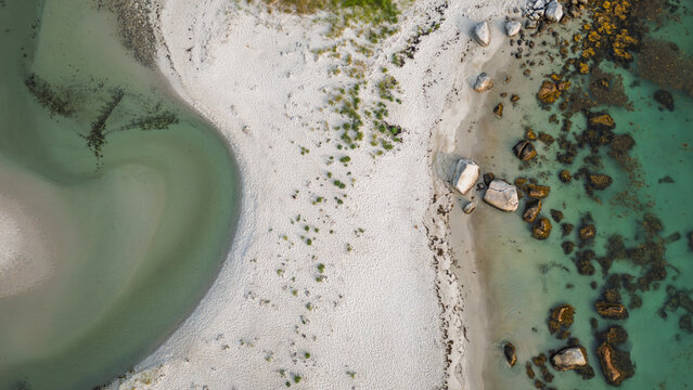 Aerial top down of Carter&rsquo;s Beach and curving tidal river