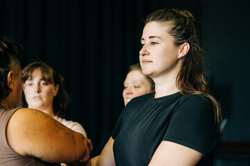 Women group discussing, listening, collaborating in a workshop