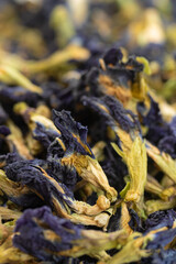 Pile of dried butterfly pea flowers. Close-up