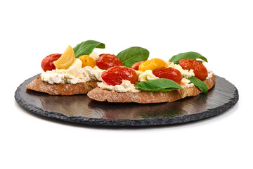 Tomato Bruschetta with Cheese and Basil, isolated on white background