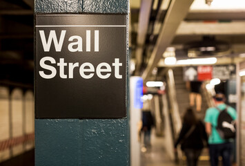 USA, New York, Manhattan, Wall street sign at underground station
