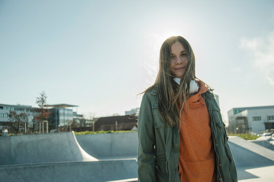 Portrait of teenage girl in skatepark
