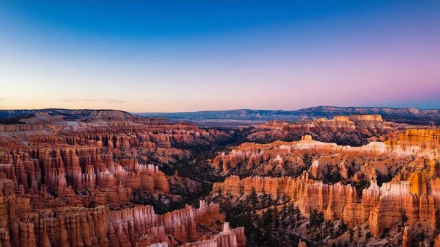 Bryce Canyon National Park Hoodoos at Sunrise with Pink and Blue Sky Keywords: Bryce Canyon, national park, hoodoos, rock formations