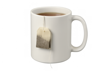 White ceramic mug holding hot tea with a teabag hanging out, ready for a comforting warm delicious brew