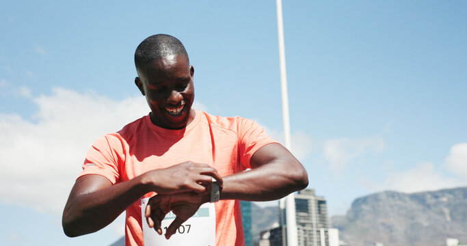 Runner, smart watch and smile with black man in city for marathon, long distance stats and tracking progress. Health, speed performance and training app with person outdoor for cardio and timer - Powered by Adobe