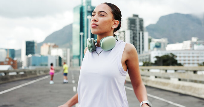 Stretching, fitness and woman in city for exercise, marathon training and start workout outdoor. Sports, athlete and person with warm up for wellness, health and mobility for running in urban town - Powered by Adobe