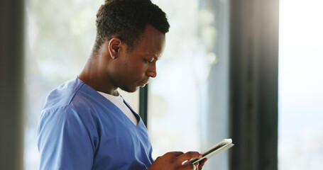 Clinic, black man and nurse with tablet for reading email, research or telehealth report....