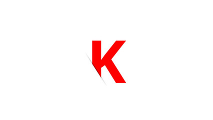 Obraz premium red letter K is on a plain white background with a cut effect.