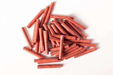 A bunch of firecrackers with red sulfur. Set of pyrotechnics, explosion hazard, macro.
