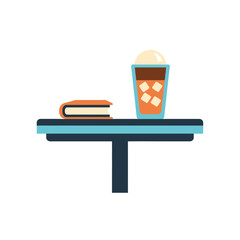 Book and iced drink on a table.