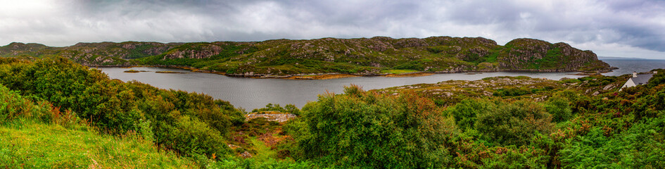 Scottish Highlands, Scotland, Uk: view of the landscape of Loch Assynt, freshwater loch in Sutherland county, in a spectacular setting between the heights of Canisp, Quinag and Beinn Uidhe