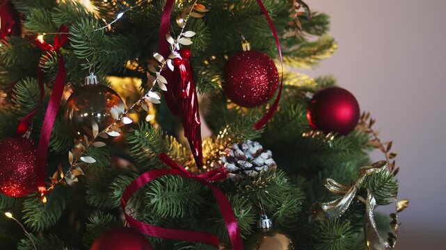 Sparkling decorated Christmas tree close up. Christmas party background.