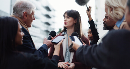 Woman, spokesperson and press with questions, city and journalists with election talk and interview. Happy, representative and outdoor with reporters for campaign updates, news and people with mic