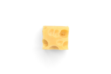 Maasdam cheese cubes isolated on white background.
