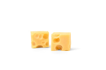 Maasdam cheese cubes isolated on white background.