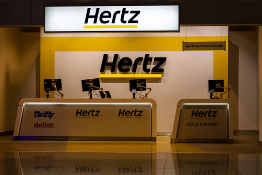 Frankfurt Airport, Germany - November 14, 2025: Hertz car rental counter services at the Frankfurt International Airport