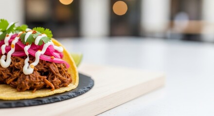 Delicious Pulled Pork Taco Topped with Pickled Onions and Cilantro