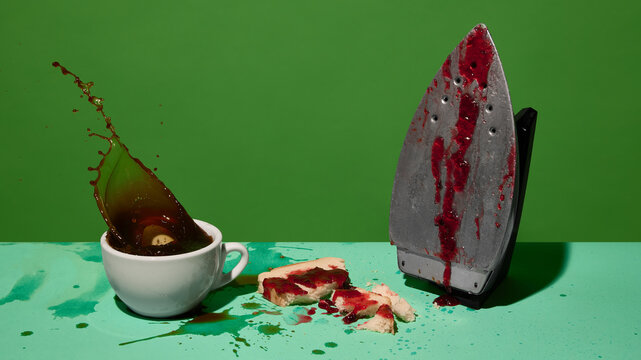Coffee splash near jam-covered iron with broken toast on green backdrop. Concept of drink campaigns, cafe communication, humor-driven food content, editorial stories and ad visuals.