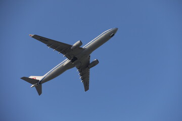 Taipei City, Taiwan - November 15 2025 - Air China Airbus A330 flying in clear blue sky.